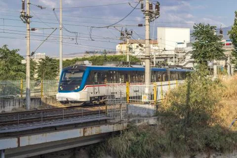 Open perspective shot of suburb train in railway Stock Photos