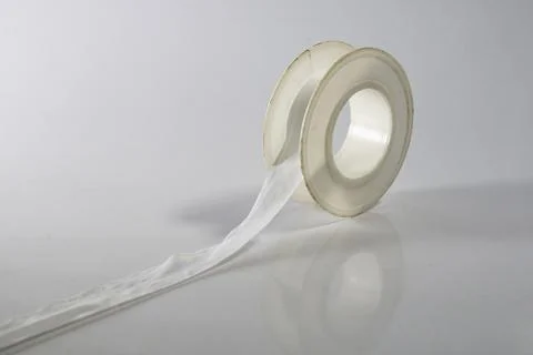 A open Pipe thread seal tape isolated on white background. Stock Photos