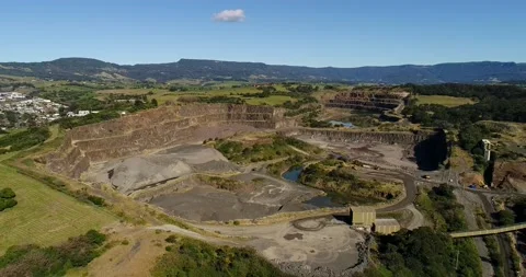 Open pit basalt mine – Bombo Quarry in Kiama, Australia – aerial 4k. Stock Footage 158187584