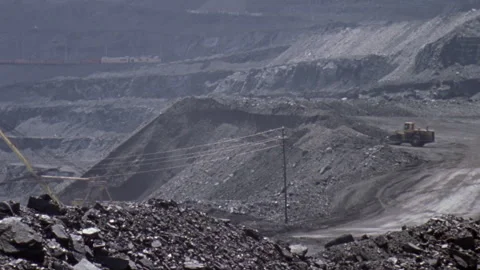 Open pit coal mine with moving heavy machinery Stock Footage 330213960