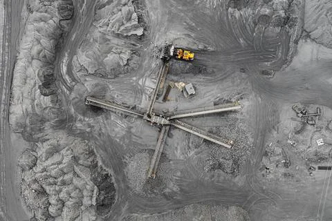 Open pit mine, breed sorting. Mining coal. Bulldozer sorts coal. Extractive 写真素材