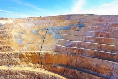 Open pit mine in full operation with remediated soils Stock Photos