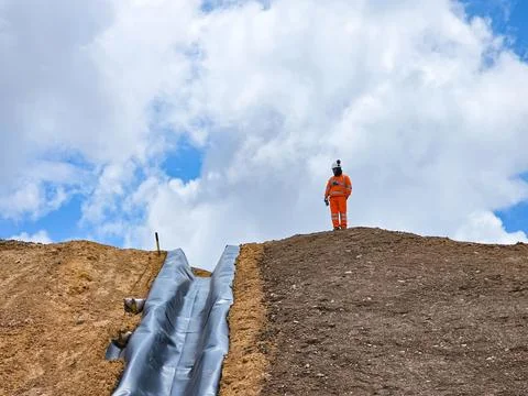Open pit mine view on construction of water canals Stock Photos