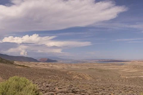Open Plains With Cloudy Sky Stock Photos