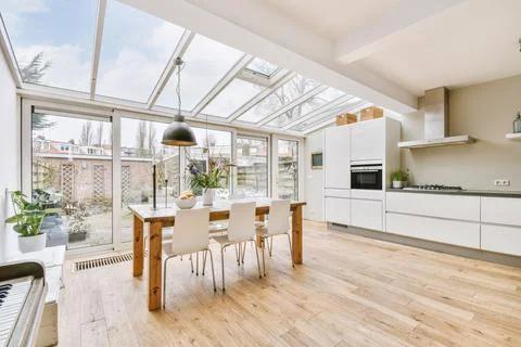 Open plan of kitchen with dining area Stock Photos