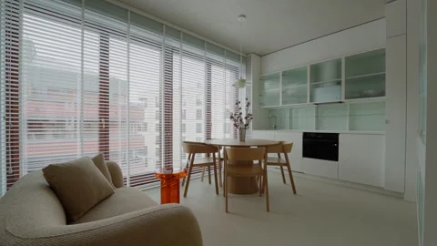 Open plan kitchen living room interior in newly renovated studio apartment Stock Footage 335540927