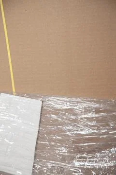 Open Plastic over Cardboard Boxes Stock Photos