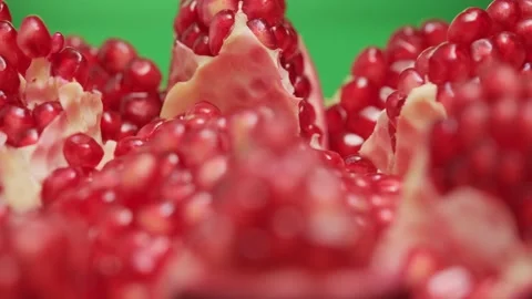 Open pomegranate fruit rotates close-up. Stock Footage 142318755
