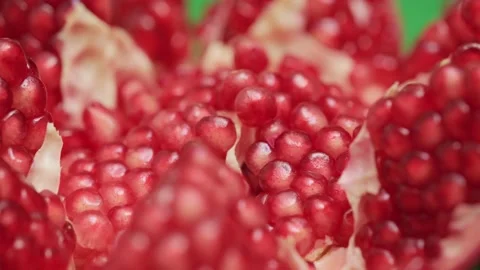 Open pomegranate fruit rotates close-up. Stock Footage 142401438