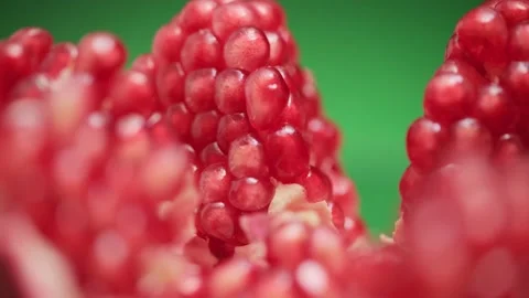 Open pomegranate fruit rotates close-up. Stock-Footage 145344490