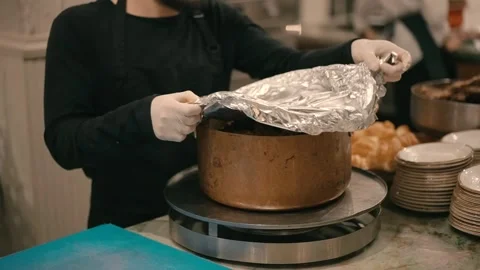 Open pot with meat ready and hot to serve Stock Footage 226605948