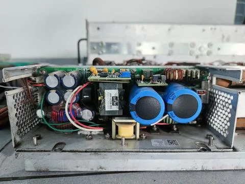 Open Power Supply Module with Blue Capacitors Stock Photos