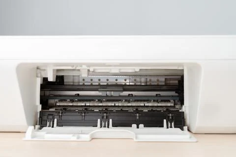 Open Printer Tray And Inner Mechanism Showing Paper Feed Rollers For Office.. Stock Photos