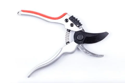 An open pruning scissors isolated Stock Photos