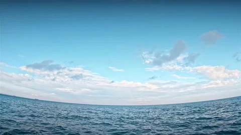 Open quite sea in the daytime with clouds Stock Footage 239729920