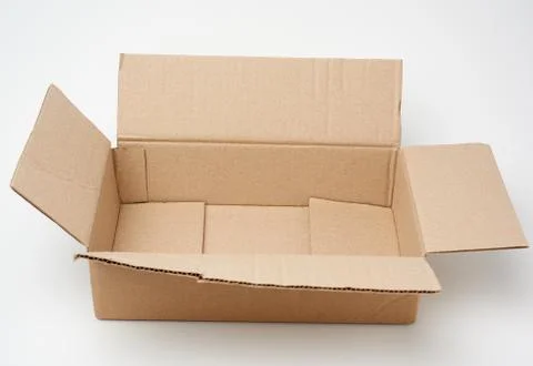 Open rectangular box made of brown corrugated cardboard on a white background Fotos Stock