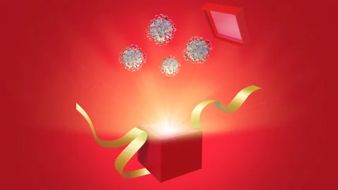 Open red gift box with bright rays of light with Covid cells going out. Stock Footage 142818292