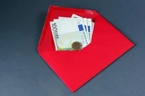 Open red paper envelope with one hundred euro banknotes and one coin Stock Photos