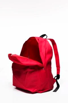 Open red school backpack on white background Stock Photos