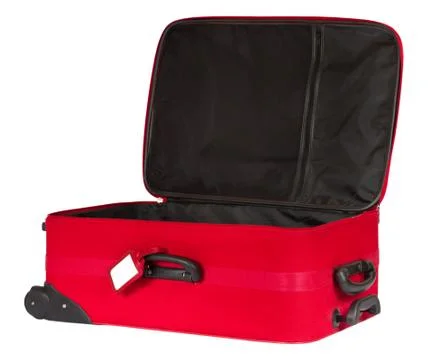 Open red suitcase with blank identification tag isolated over white. Stock Photos