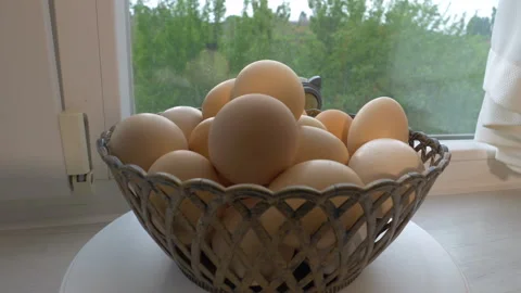 Open the refrigerator door, take chicken eggs from the refrigerator tray Stock Footage 323938597