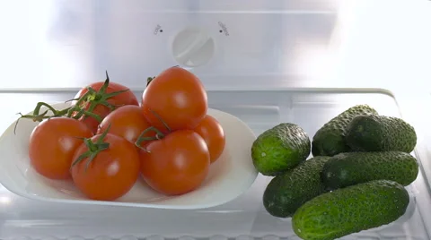 Open refrigerator with fresh food Stock Footage 61532876