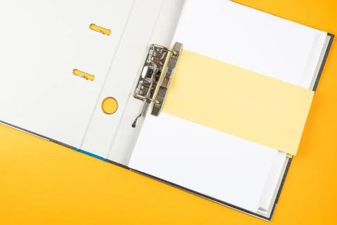 Open ring binder, file folder on orange background Stock Photos