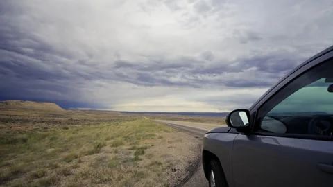 Open Road Adventure Under Dramatic Skies Stock Footage 303947949