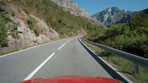 Open road along the winding mountain through the forest Stock Footage 82014639
