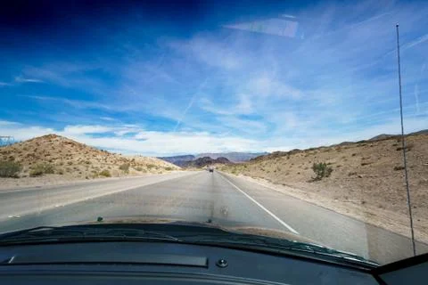 Open road in desert as seen through car windscreen, Las Vegas, Nevada, USA. c Stock Photos