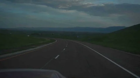 OPEN ROAD DRIVING INTO CLOUDY MOUNTAINS SLOW MOTION Stock Footage 81008416