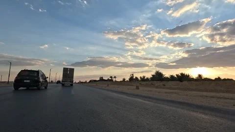 Open road experience across Cairo Fayoum Desert Road endless desert horizons Stock-Footage 330078981