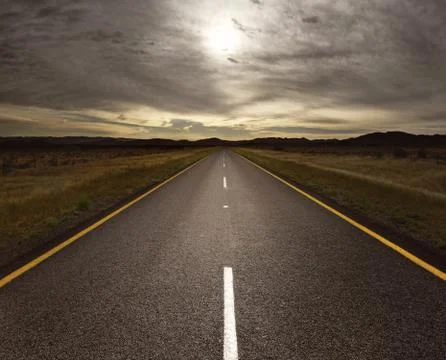 Open road leading into the light Stock Photos