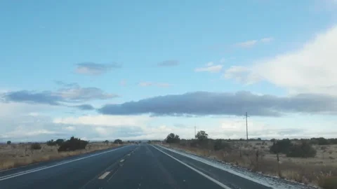 Open Road Under a Clear Sky on Highway AZ-89A Stock Footage 281873032