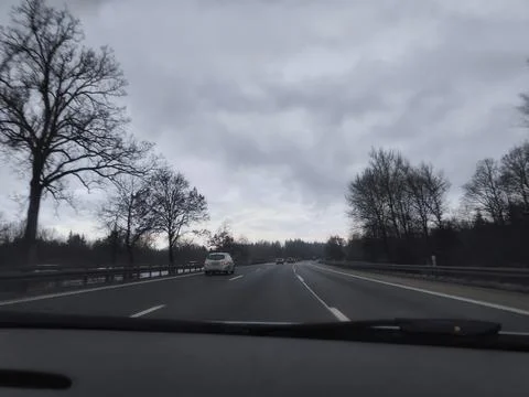 Open Road Under a Grey Sky 写真素材