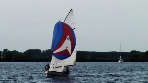   Open sailboat Valk with Spinacker Stock Footage 85268912