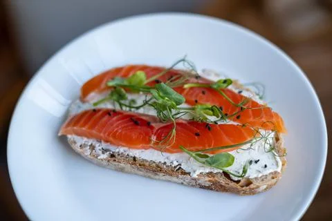 Open sandwich with cereal bread and salmon, close up, selective focus Stock Photos