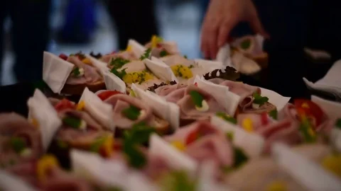 Open sandwich at the party buffet table Stock Footage 71122334