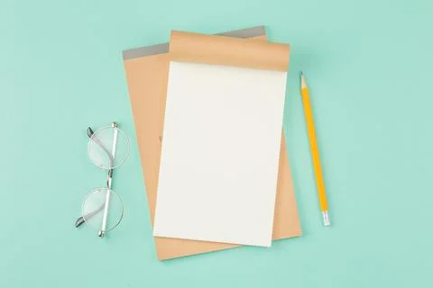 Open school notebook with pencil. Stock-Fotos