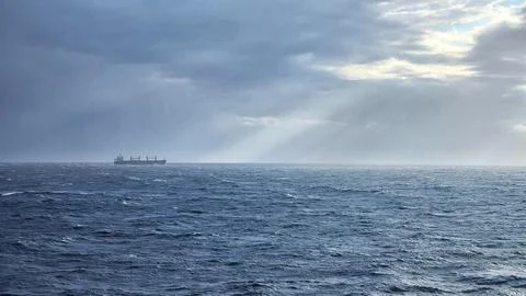 Open Sea Horizon with Dramatic Clouds and Ocean Waves. Stock Photos