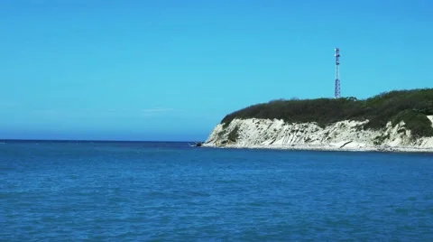 The open sea with small waves down the stone Stock Footage 62808618