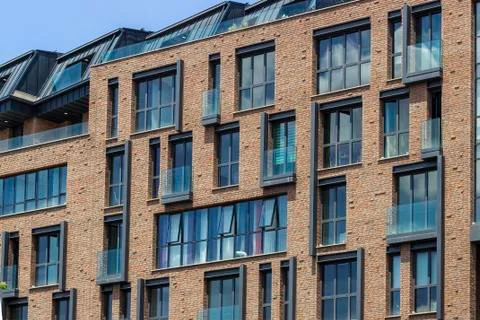 Open shoot of brick and open glazing facade office building Stock Photos