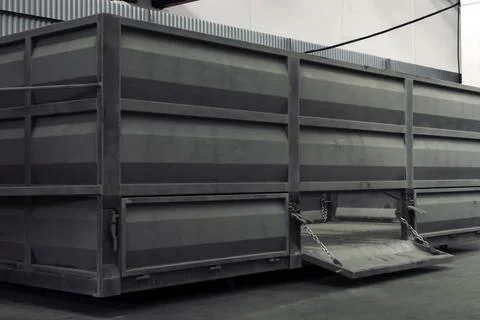 Open-sided iron container. Empty cargo container. Stock Photos