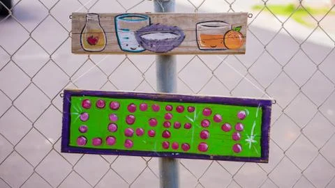 Open sign on the fence Stock Photos