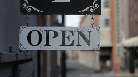 Open Sign Flaps in the Breeze Stock Footage 83189830