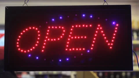 Open sign in front of shop Stock Footage 24821096