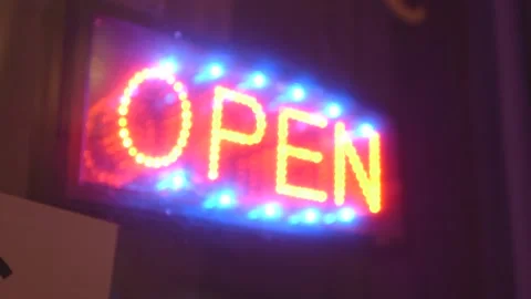 OPEN sign on a window in a city Stock Footage 149242400