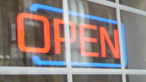 Open sign in  window glowing Video stock 106067288