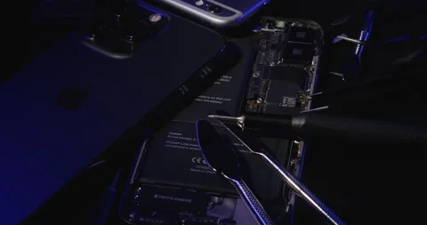 Open Smartphone ready for batter replacement, Fixing old iPhone and Androids Stock Footage 237413125