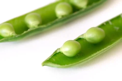 Open snap pea macro on white background Stock Photos